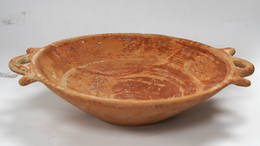 An Ancient Greek terracotta two-handled dish, circa 5th/4th century BC. Condition - good restored condition